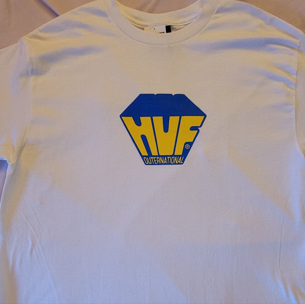 HUF White Tee with Blue and Yellow Graphic
